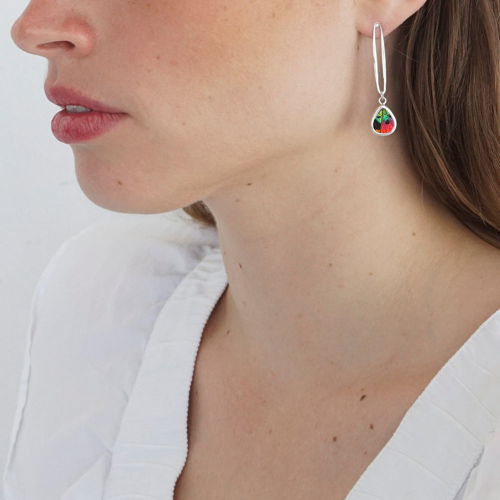 
                  
                    My Store Earrings Small Teardrop-Shaped Pendant Earrings on Link Post | Real Urania Ripheus Butterfly - Sunset Series | Sterling Silver
                  
                
