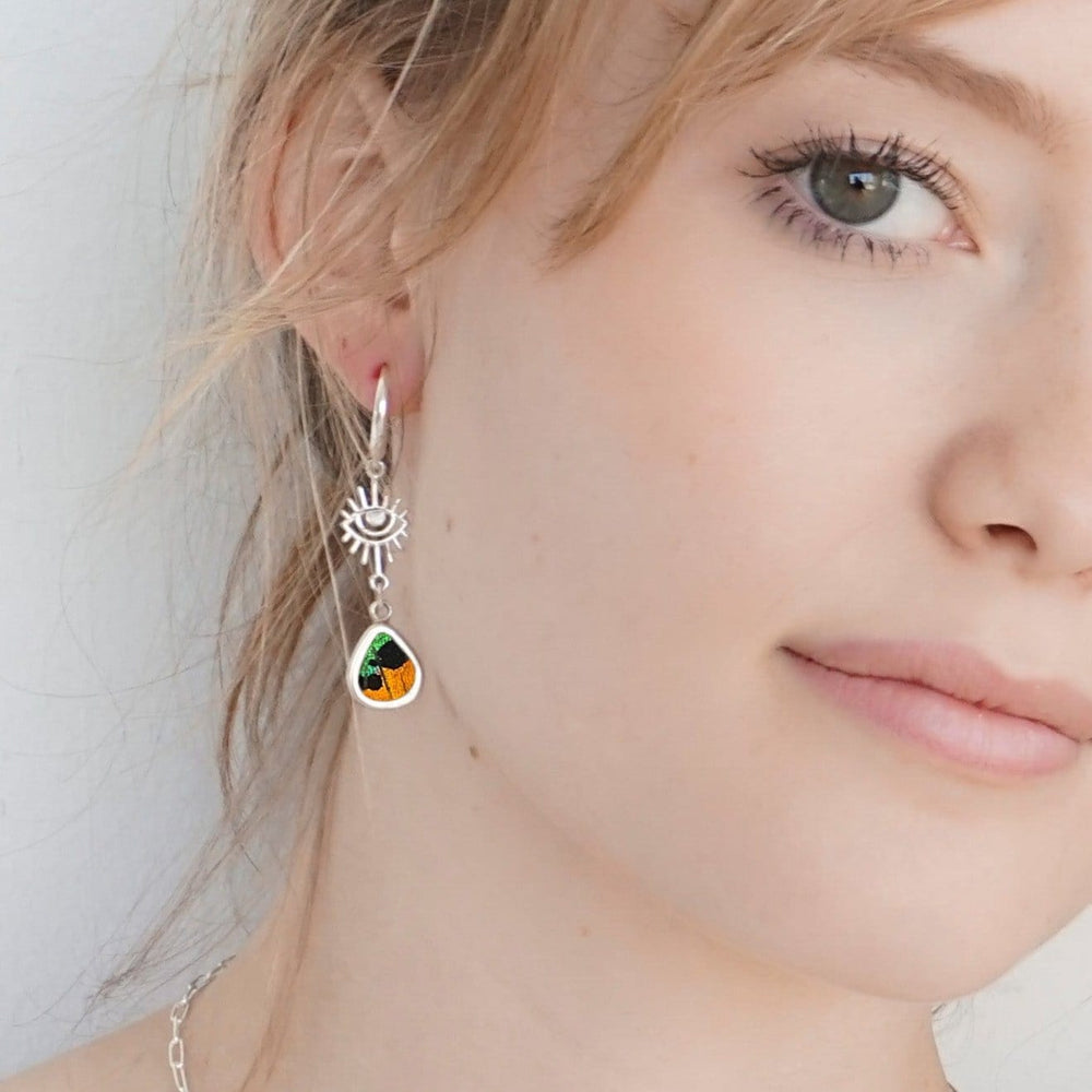 
                  
                    My Store Earrings Small Teardrop-Shaped Pendant Earrings with Evil Eye on Leverback | Real Urania Ripheus Butterfly - Sunrise Series | Sterling Silver
                  
                