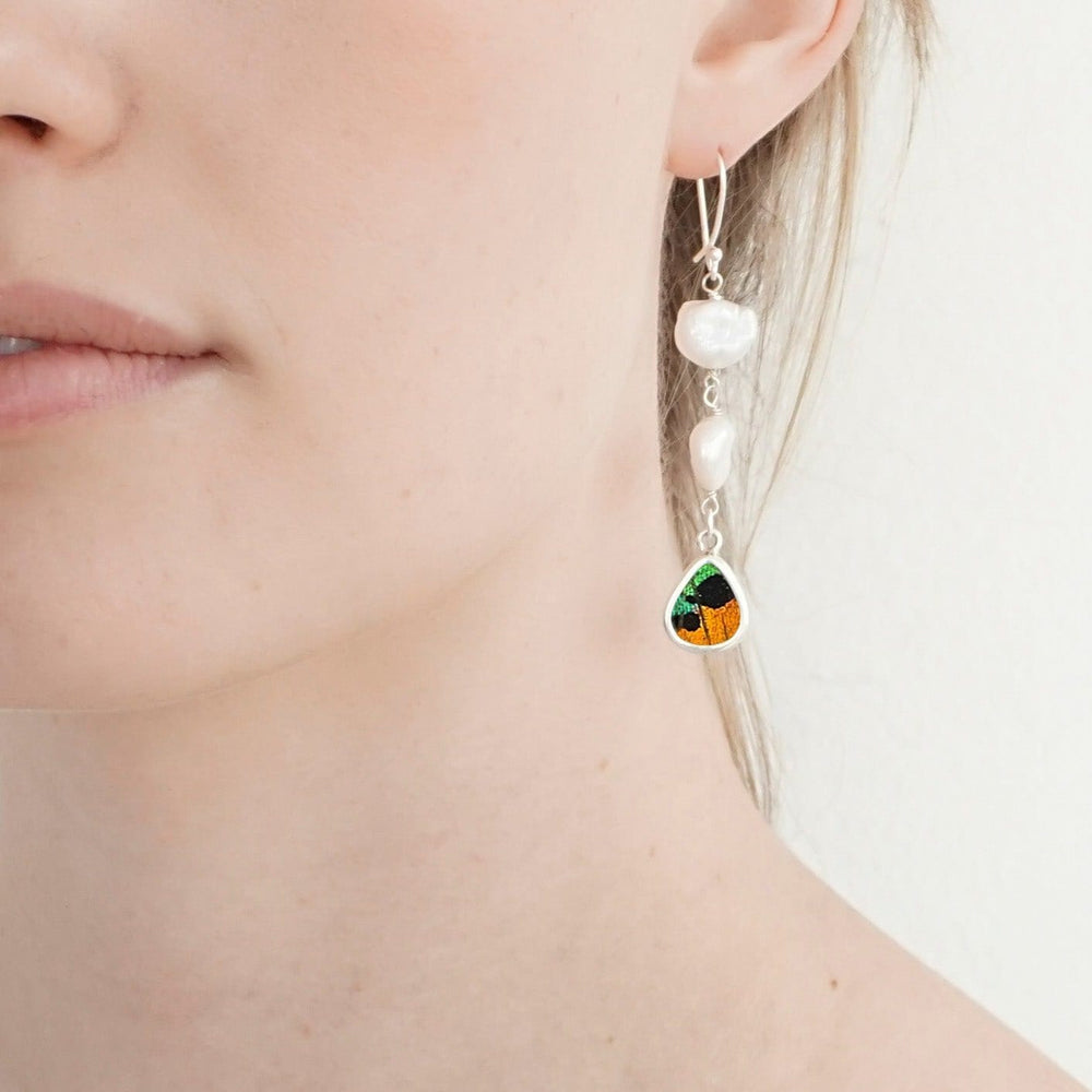 
                  
                    My Store Earrings Teardrop Shaped Pendant Earrings With Two Freshwater Pearls | Real Urania Ripheus Butterfly | Sunrise Series
                  
                
